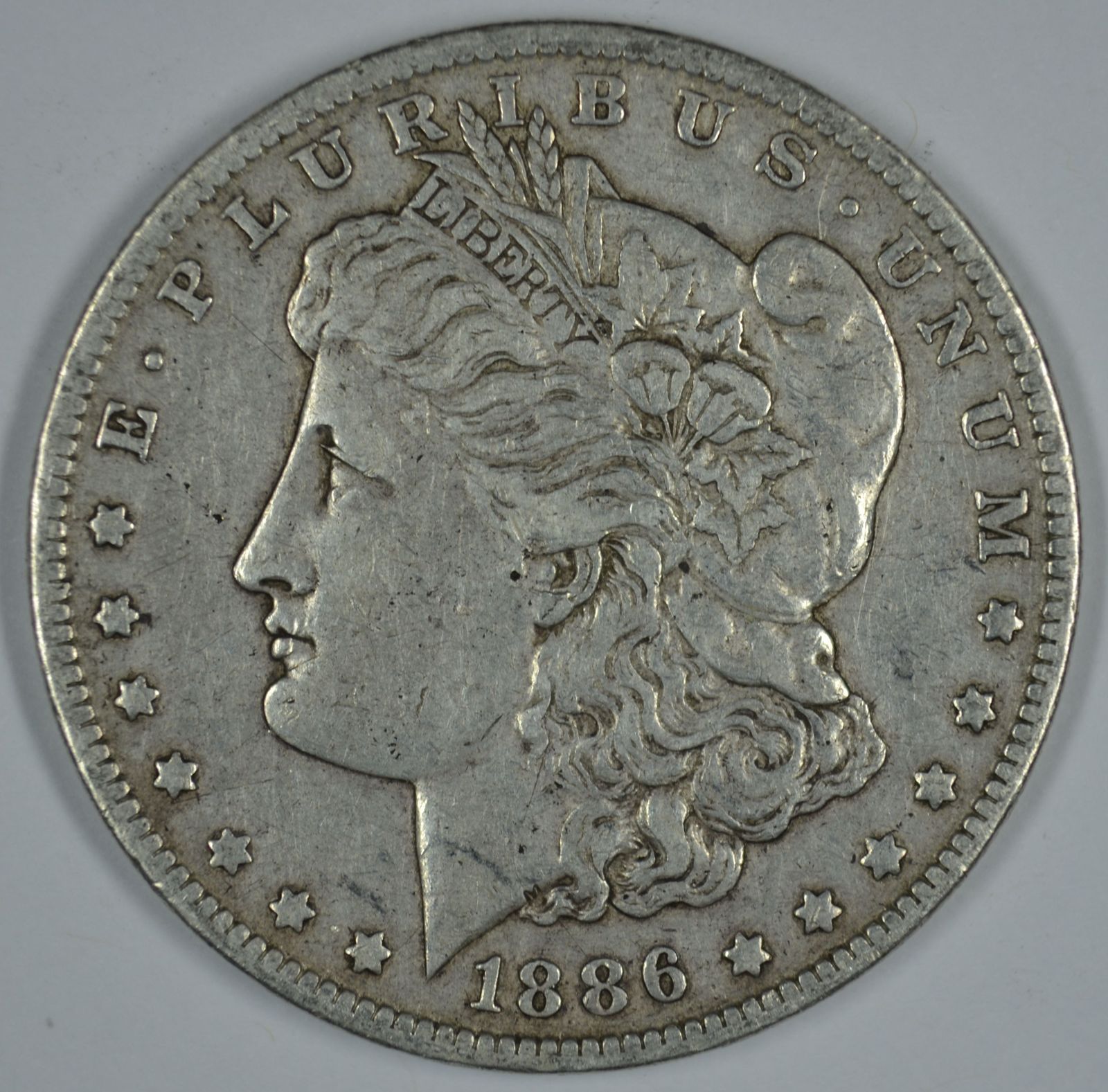 1886 O Morgan circulated silver dollar F details - $50.00
