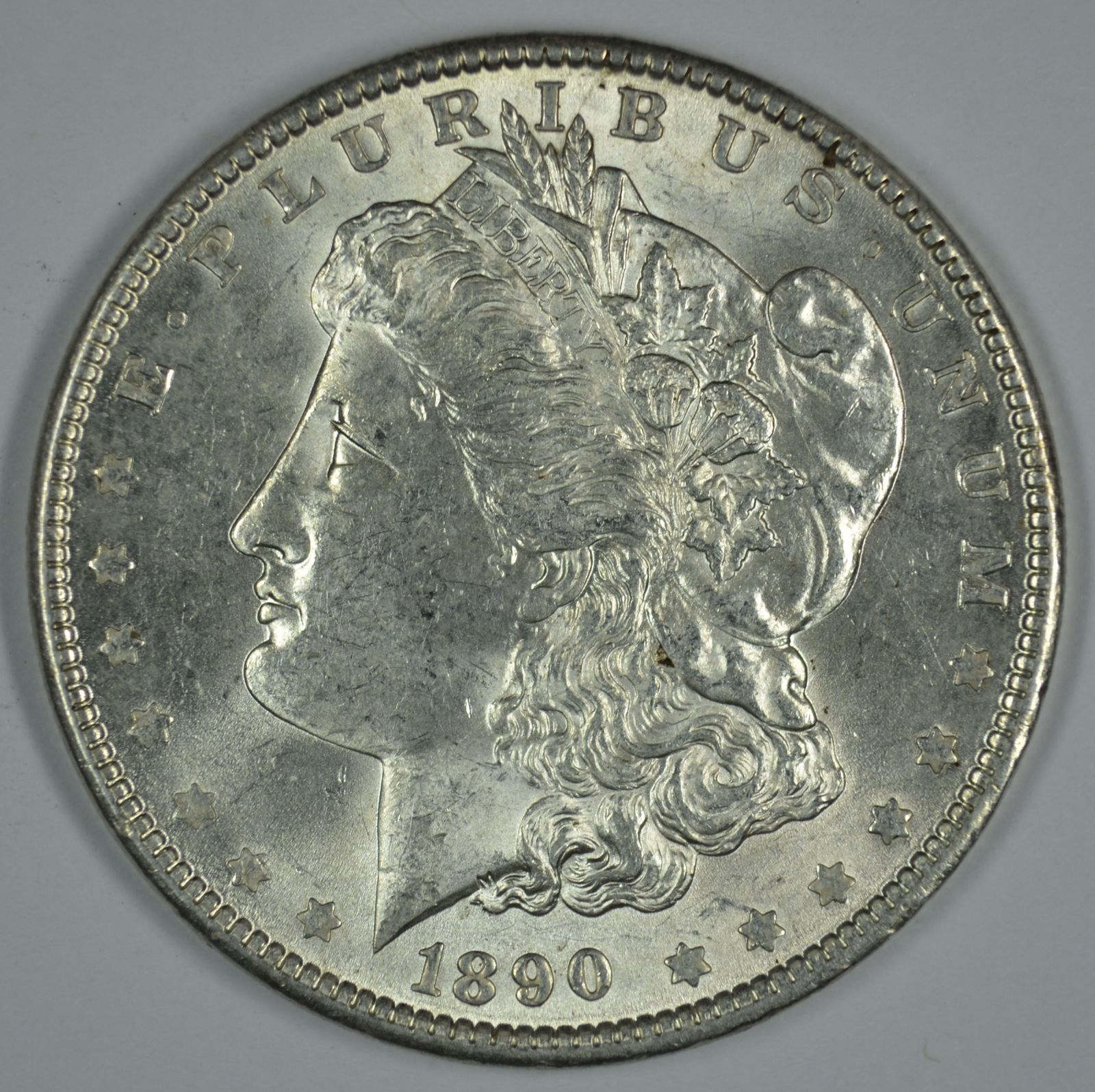 Primary image for 1890 P Morgan circulated silver dollar AU details