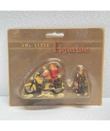 Vintage Christmas Village Figurines - Couple On Motorcycle &amp; Boy With Bags - $34.57 CAD