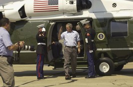 President George W. Bush salutes as he exits Marine One at Keesler Photo Print - £6.92 GBP+