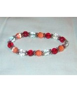 bracelet handmade in beautiful colors of red coral silver - $8.00