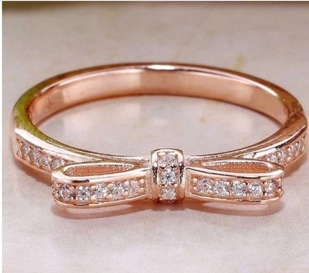 Primary image for Beautiful delicate bow S925 rose gold ring encrusted with CZ stones,in all sizes