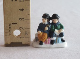 Christmas Village Figurine Boys Children Sitting On Wall w/ Gifts ~1&quot; Ceramic - £7.78 GBP