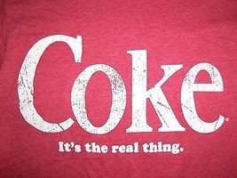 Coca-Cola Coke Soda Pop Logo &quot;It&#39;s the Real Thing&quot; 50/50 Graphic Print T... - $17.17