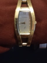 Women&#39;s Gold Tone Ivory Face  Fossil Tank Watch  - $391.43 MXN