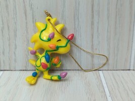Whitmans Peanuts Woodstock bird tangled in Christmas Tree Lights Ornament - $9.89