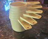 Vintage Set of 6 Tupperware Stacking Measuring Cups Pale Flat Yellow Retro - $32.95