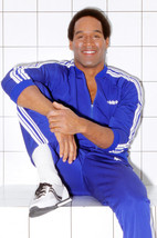 O.j. Simpson Rare Smiling Pose In Blue Track Suit Circa 1980 18x24 Poster - $23.99