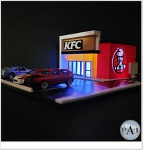 Unassembled Hot Wheels Compatible KFC Diorama with working drive through... - $60.78