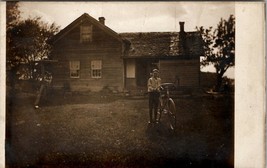 RPPC Boy Posing with His Racing Bicycle Rundown House Postcard U5 - £11.54 GBP