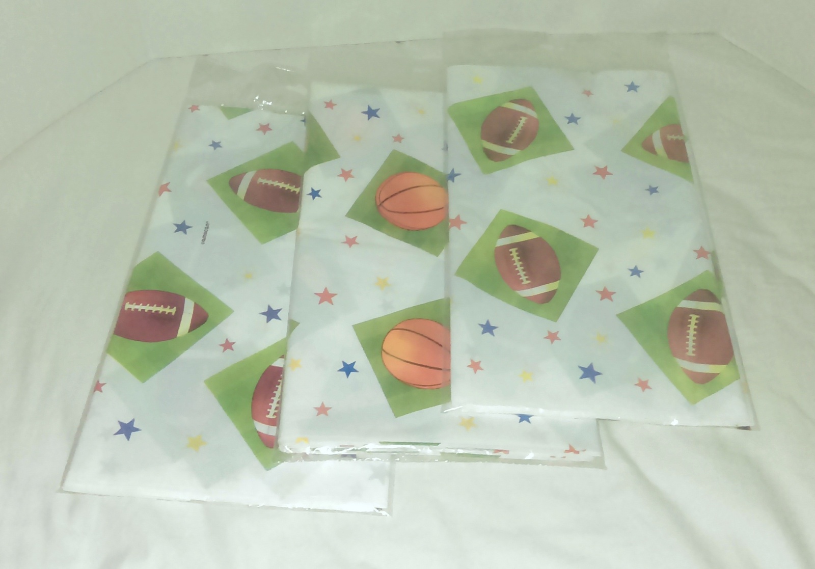 Set of 3 AMSCAN Championship Football/Basketball Plastic Tablecover  - $6.99