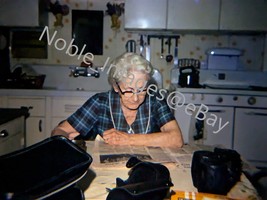 1972 Older Woman Kitchen Table Newspaper Chicago 35mm Color Slide - £3.44 GBP