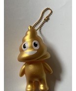 Poop man ball chain gold - $397.94 MXN