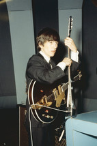 The Beatles George Harrison tuning guitar before performance 1965 24x18 Poster - $23.99