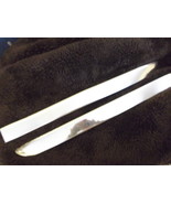 1947-48 Ford Passenger Pair Front Fender Lower Mouldings NOS - $102.41 CAD