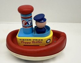 1967 FISHER PRICE PLASTIC TUGGY TOOTER BOAT - $9.85