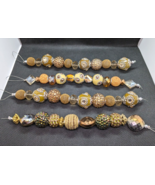 Lot of Four Bead Strands Ornate Textured Multible Designs Focal Beads Je... - £12.54 GBP