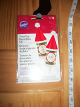 Wilton Party Supplies Set Santa Hat Christmas Holiday Treat Pop Decorating Kit - $9.49