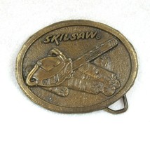 Vintage 1970s SKILSAW Belt Buckle Aged Brass Plated Metal Chainsaw &amp; Logs Oval - £16.01 GBP
