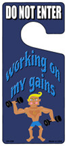 Working On My Gains Novelty Metal Door Hanger DH-228 - $18.95