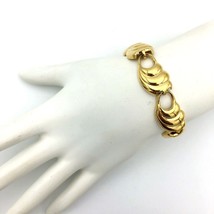 NAPIER vintage 8-panel bracelet - late 1980s shiny gold-tone swirl wave 7&quot; - $20.00