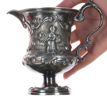 Victorian Sterling Repousse four seasons creamer - $391.05