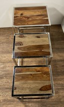 Set of Three 21" Silver And Brown Solid Wood Nested Tables - $7,698.73 MXN