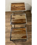 Set of Three 21 Inch Silver And Brown Solid Wood Nested Tables - €352,08 EUR