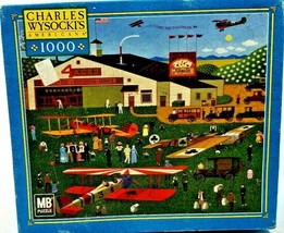 Charles Wysocki&#39;s Americana 1000 Pc Puzzle - Four Aces Flying School - $7.91
