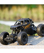 Alloy climbing mountain monster 4WD remote control car toy model 1:16 of... - £20.74 GBP