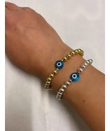 Evil eye bracelets gold and silver beads elasticated stretchy unisex han... - $380.72 MXN