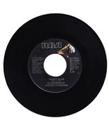 Elvis Presley. Moody Blue/She Thinks I Still Care 45 rpm - $278.01 MXN