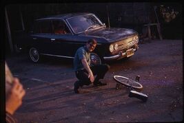 35 mm color slide * March 1968 DATSUN CAR - Man fell off UNICYCLE gettin... - $5.45