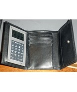 Wallet Trifold with Calculator and World time - $12.30 CAD