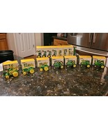 Vintage John Deere 7 pc Miniature Tractor Set by ERTL 1:64 Scale - $60.95 CAD