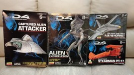 Four ID4 model kits: Captured Alien Attacker, Alien Exoskeleton, PT-17, ... - £180.13 GBP