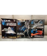 Four ID4 model kits: Captured Alien Attacker, Alien Exoskeleton, PT-17, ... - £182.69 GBP