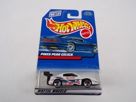 Van / Sports Car / Hot Wheels Mattel Wheels Pikes Peak Celica #H17 - £10.20 GBP