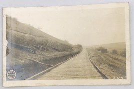 Vintage WWI RPPC RTO Engrs Wooden Road w/ Artillery Shells Real Photo Postcard - £18.50 GBP