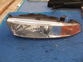 1999 2000 2001 GALANT LEFT HEADLIGHT OEM USED ORIGINAL MITSUBISHI PART - $143.05