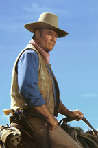 John Wayne in Chisum classic portrait on horse gunbelt in profile 18x24 Poster - $23.99