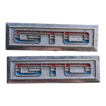 OEM Door Panel Emblem Trim Set Pair 1974 Pontiac GTO 9738884 - $49.99