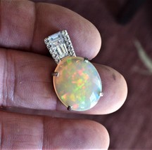 Opal Pendant . A 11.3cwt. Opal. Independent Master Value Appraisal $1,850 - £751.38 GBP
