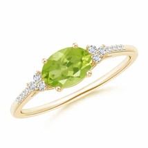 ANGARA Horizontally Set Oval Peridot Solitaire Ring with Trio Diamond Accents - £554.53 GBP