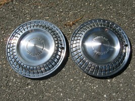 Factory 1975 to 1980 Pontiac Sunbird Astre 13 inch metal hubcaps wheel covers - $27.70
