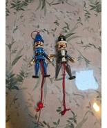 Lot Of 2 Vintage Wooden Nutcracker Soldier String Pull Toy Ornament - $28.95