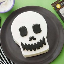 Wilton Candy Halloween Icing Decorations 4 Pc Skull Skeleton Head Sugar Edible - £7.83 GBP