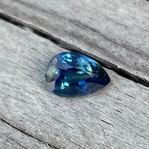 Natural Teal Sapphire | Pear Cut | 6.86x4.77 mm | 0.80 Carat | Teal Sapphire | L - £503.59 GBP