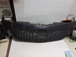 09 10 Toyota Corolla upper grill assembly OEM 53111-02450 - €21,24 EUR