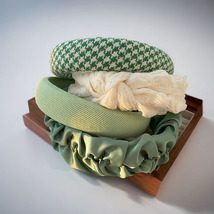 Artistic Green Fabric Headband with a Fresh and Creative Style.  - $5.50